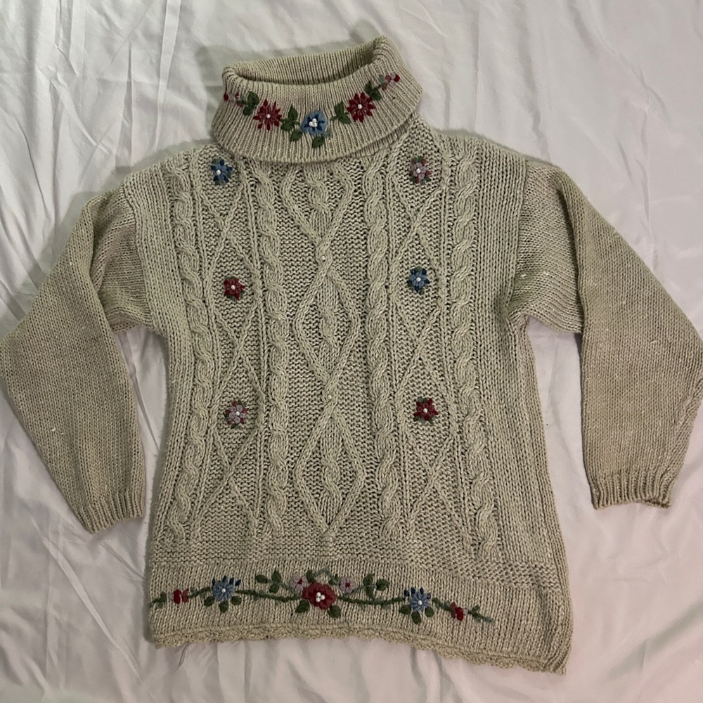 Hand knitted and embroidered turtleck sweater